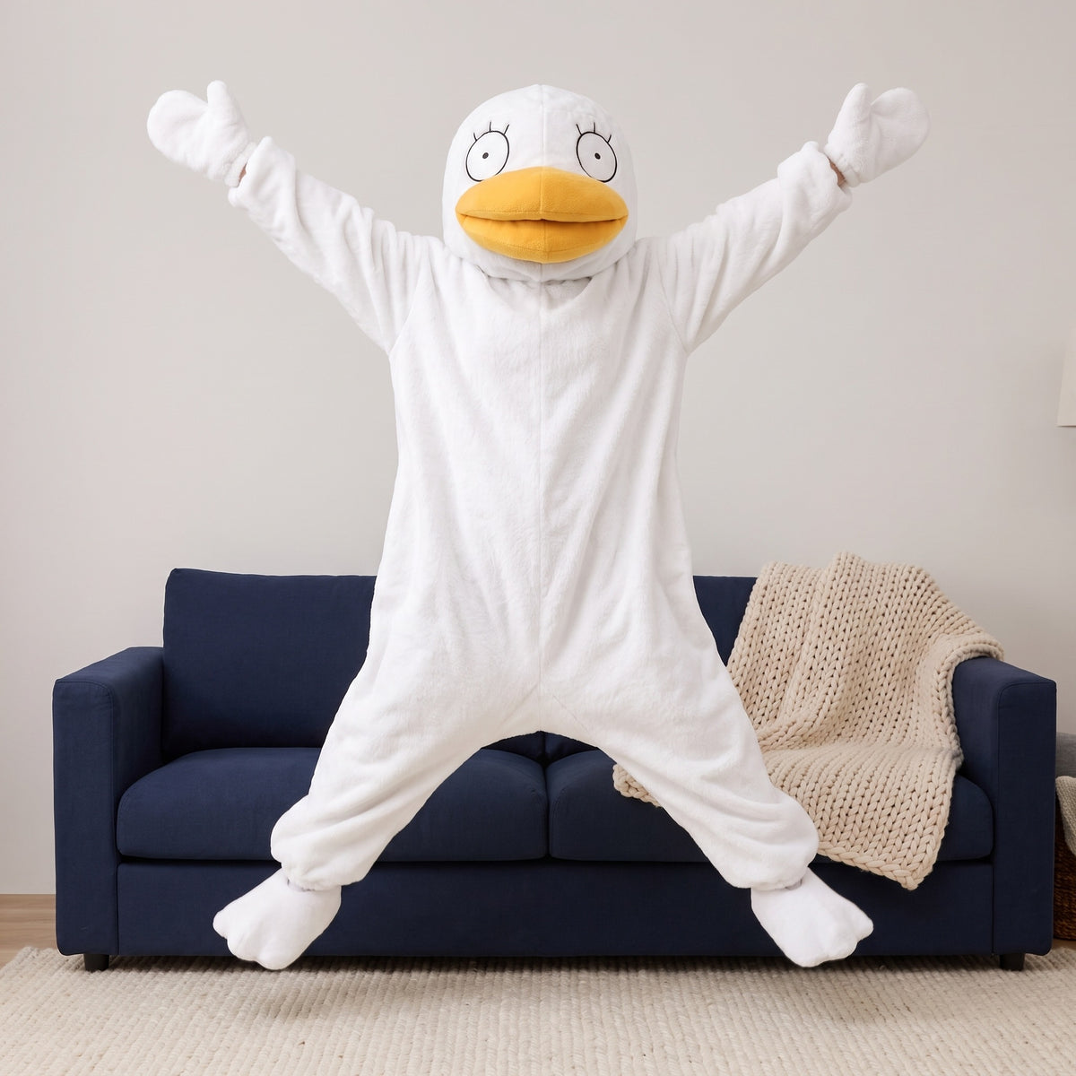 Quackenstein duck onesie in White, mid-air jump