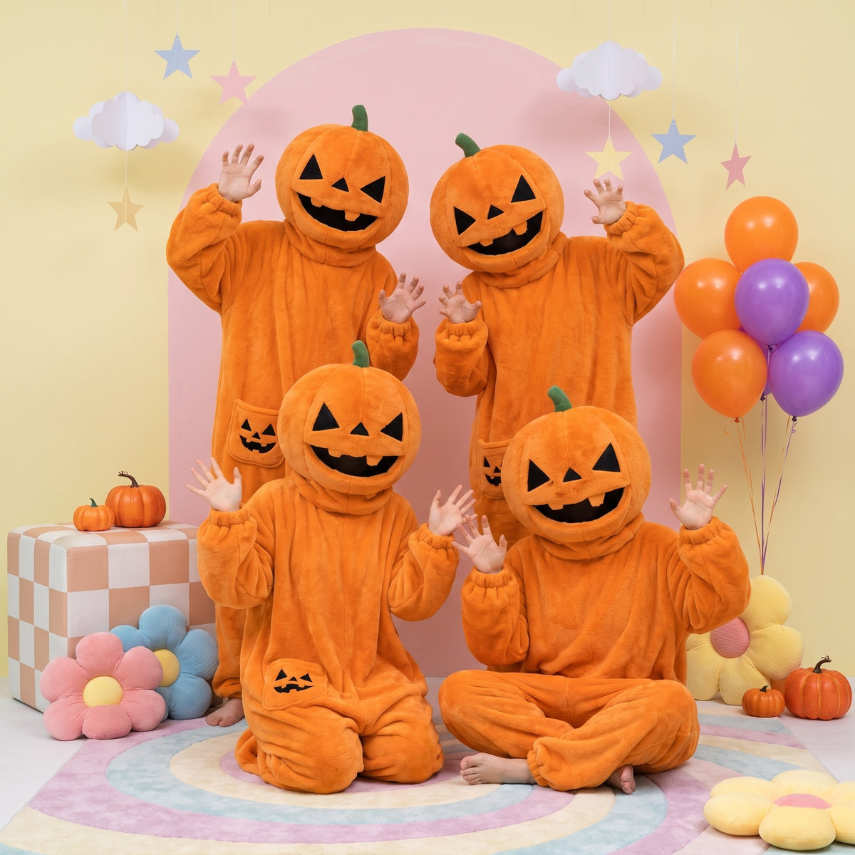 Squashenstein pumpkin onesies, together in the studio