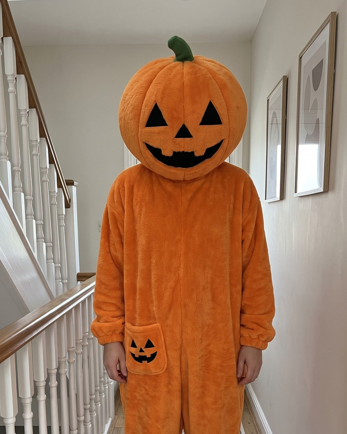 Squashenstein pumpkin onesie worn at home